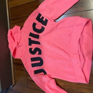 Pink sweater with black letters